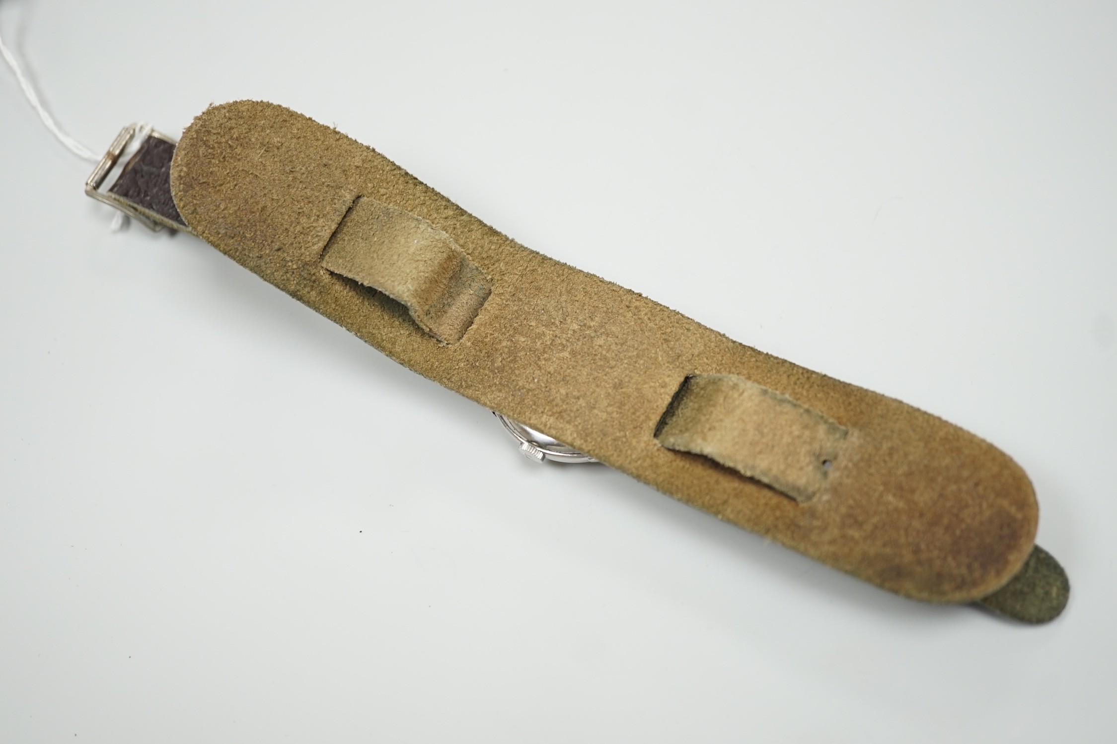 A gentleman's early 1950's stainless steel Omega wrist watch, with baton numerals and subsidiary seconds, movement c.266, on associated leather strap, case diameter 36mm.